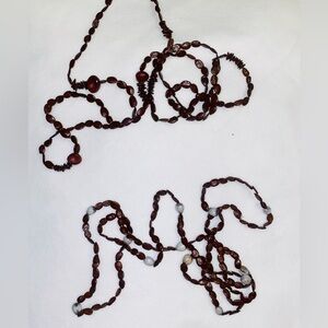 2 necklaces made of wood